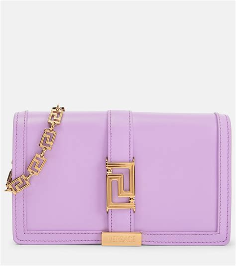 versace collection pebbled convertible wallet|Versace greek goddess wallet.